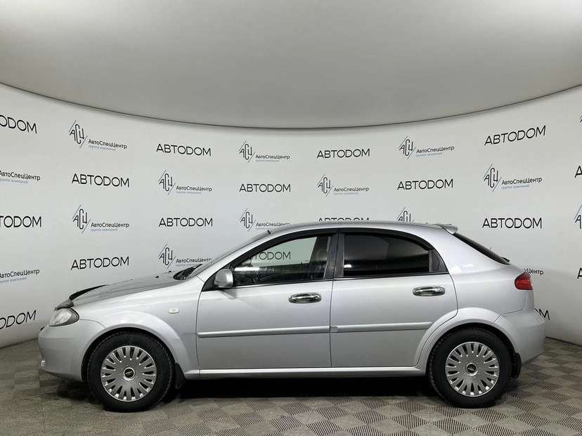 Автомобиль Chevrolet Lacetti I поколение 1.6 MT (109 л.с.) SX Серебристый 2009 с пробегом 129 200 км
