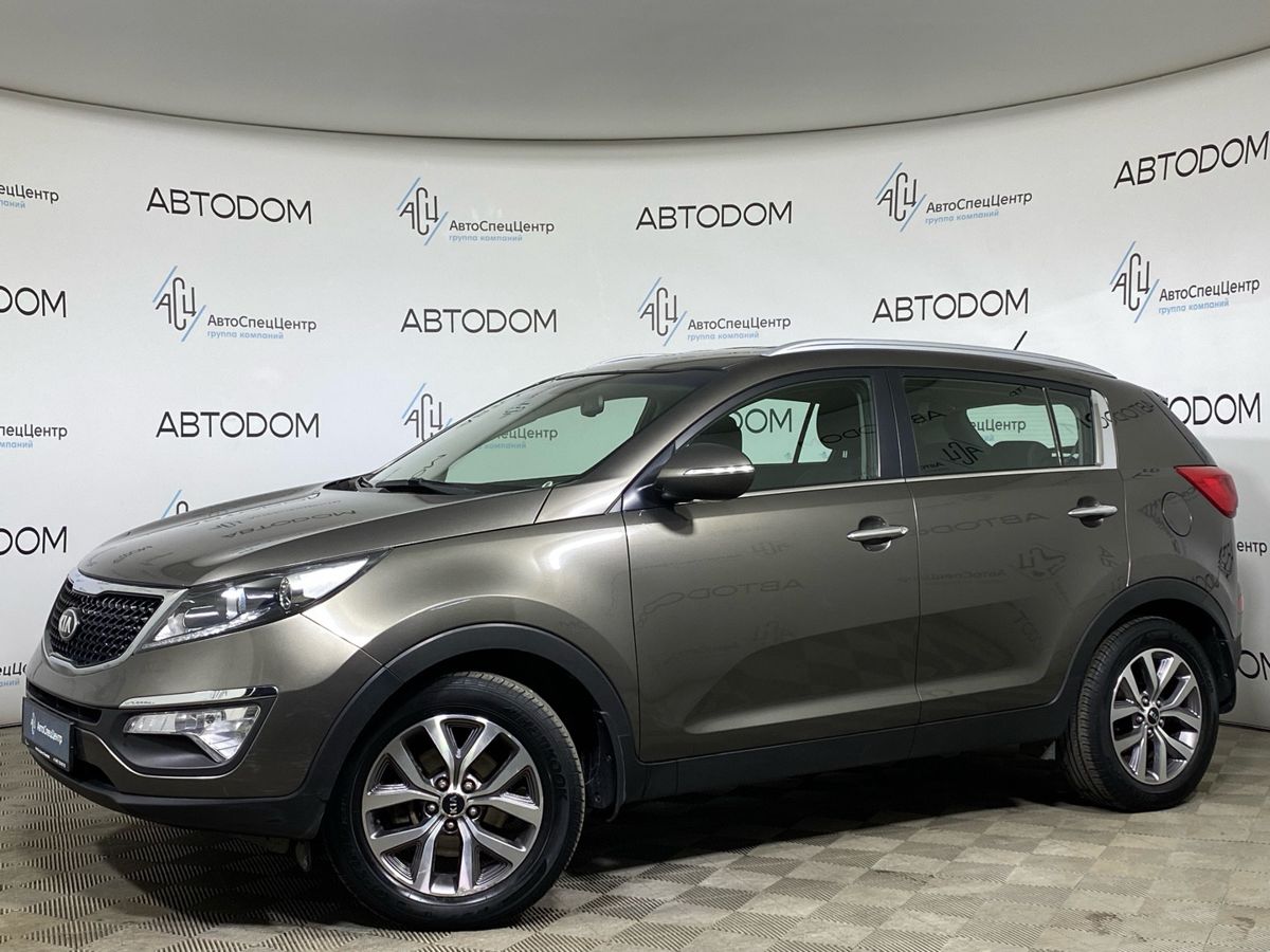Kia Sportage III [рестайлинг] 2.0 AT (150 л.с.) Classic +обогрев Коричневый 2015 с пробегом 100 624 км