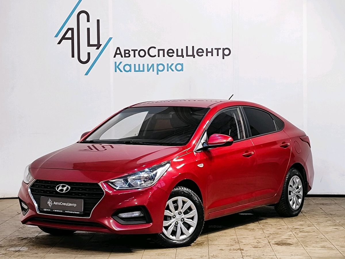 Автомобиль Hyundai Solaris II поколение 1.6 AT (123 л.с.) Comfort Красный 2018 с пробегом 131 452 км