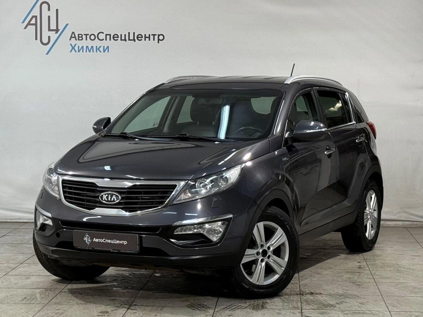 Автомобиль Kia Sportage III поколение 2.0 AT 4WD (150 л.с.) Prestige Серый 2012 с пробегом 130 000 км
