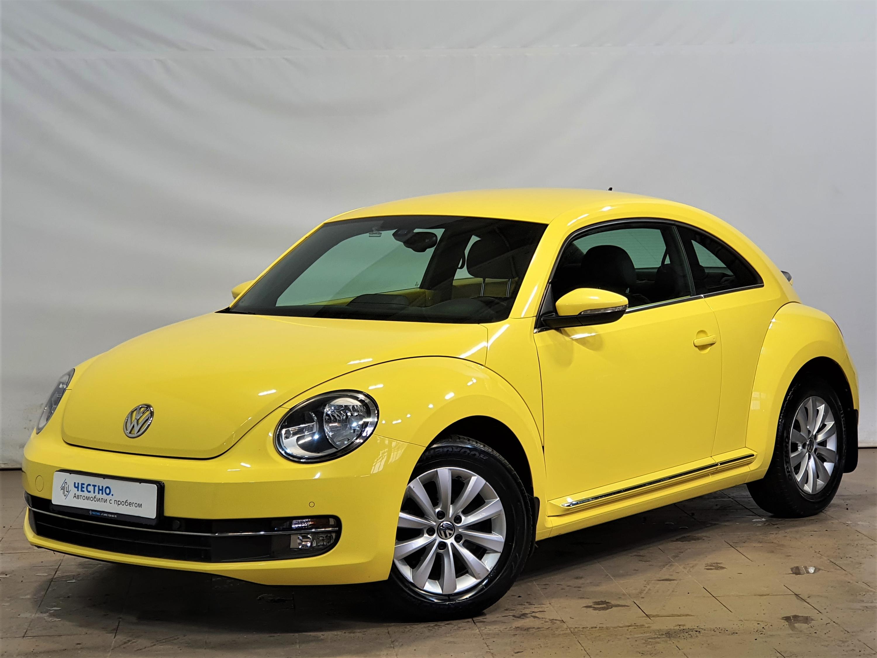Автомобиль Volkswagen Beetle II поколение (A5) 1.4 AMT (160 л.с.) Design Жёлтый 2014 с пробегом 52000 км