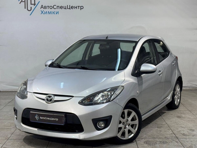 Автомобиль Mazda 2 II поколение (DE) 1.5 AT (103 л.с.) Base Серебристый 2008 с пробегом 98 000 км
