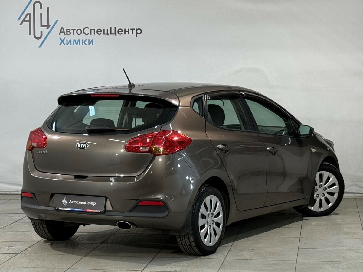 Автомобиль Kia Ceed II поколение 1.6 MT (129 л.с.) Comfort Коричневый 2014 с пробегом 197 000 км