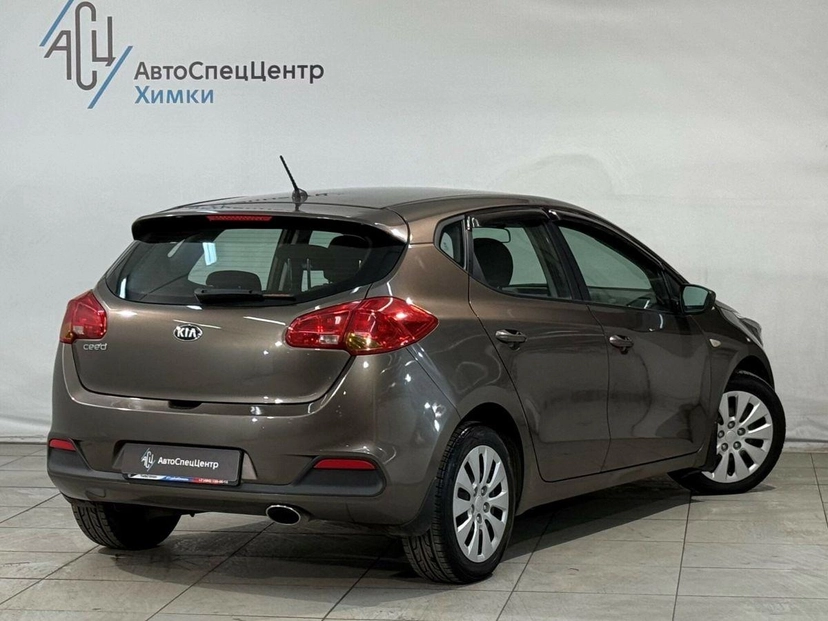 Автомобиль Kia Ceed II поколение 1.6 MT (129 л.с.) Comfort Коричневый 2014 с пробегом 197 000 км