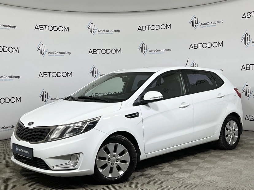 Автомобиль Kia Rio III поколение 1.6 4AT (123 л.с.) Prestige Белый 2012 с пробегом 164 468 км