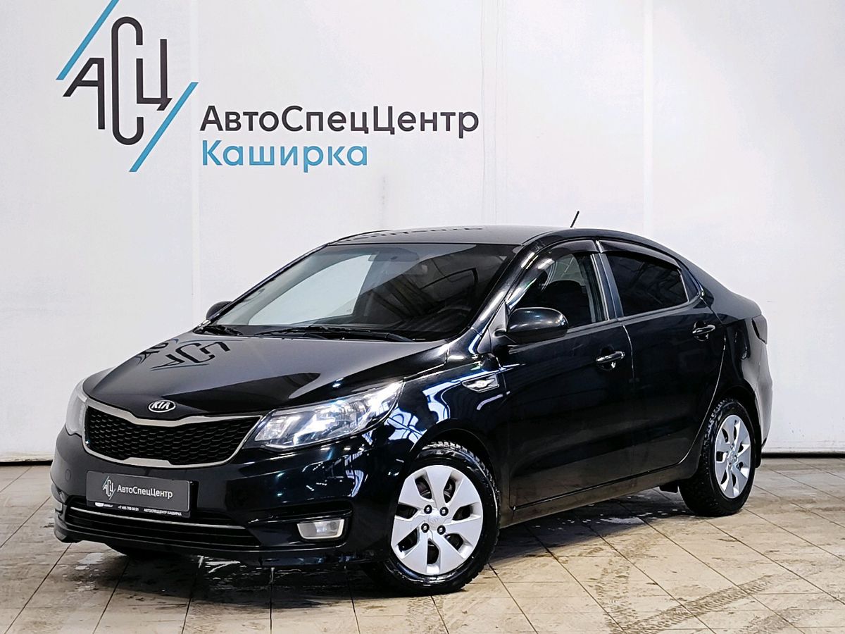 Kia Rio III [рестайлинг] 1.4 MT (107 л.с.) Comfort Кондиционер Чёрный 2015 с пробегом 148 071 км