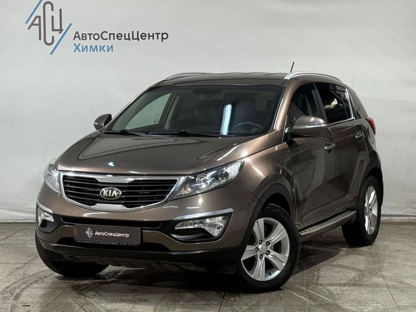 Автомобиль Kia Sportage III поколение 2.0 AT (150 л.с.) Comfort Коричневый 2013 с пробегом 139 000 км