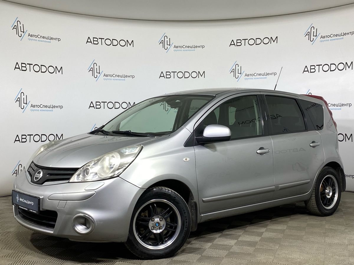 Автомобиль Nissan Note I (E11) [рестайлинг] 1.6 AT (110 л.с.) Tekna Серебристый 2012 с пробегом 289 954 км