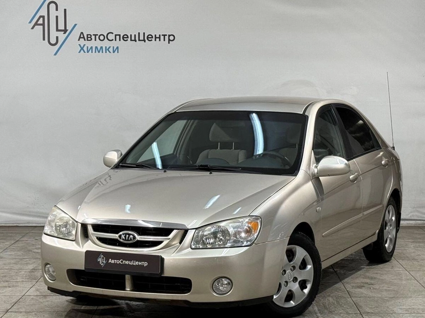 Автомобиль Kia Cerato I поколение 1.6 AT (105 л.с.) Base Золотой 2006 с пробегом 167 000 км