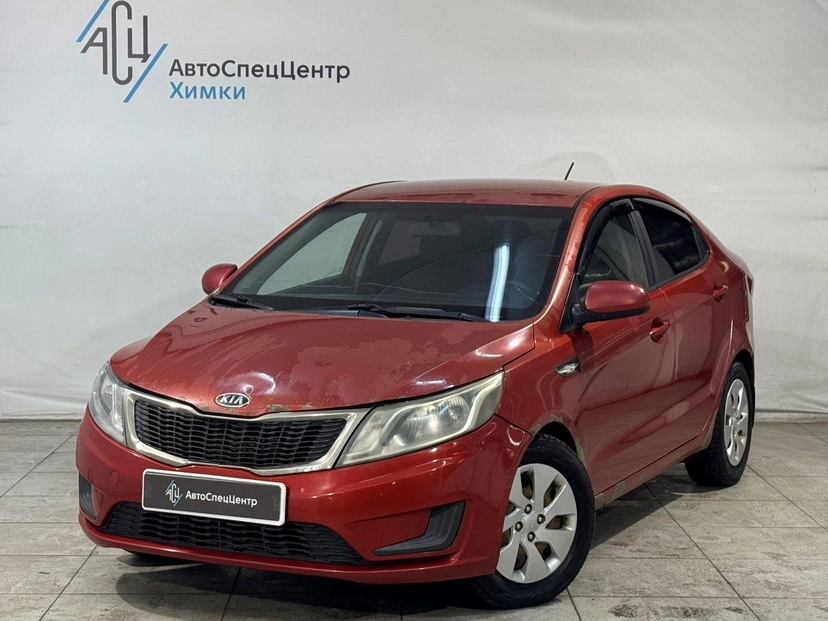 Автомобиль Kia Rio III поколение 1.4 MT (107 л.с.) Comfort Красный 2012 с пробегом 230 000 км