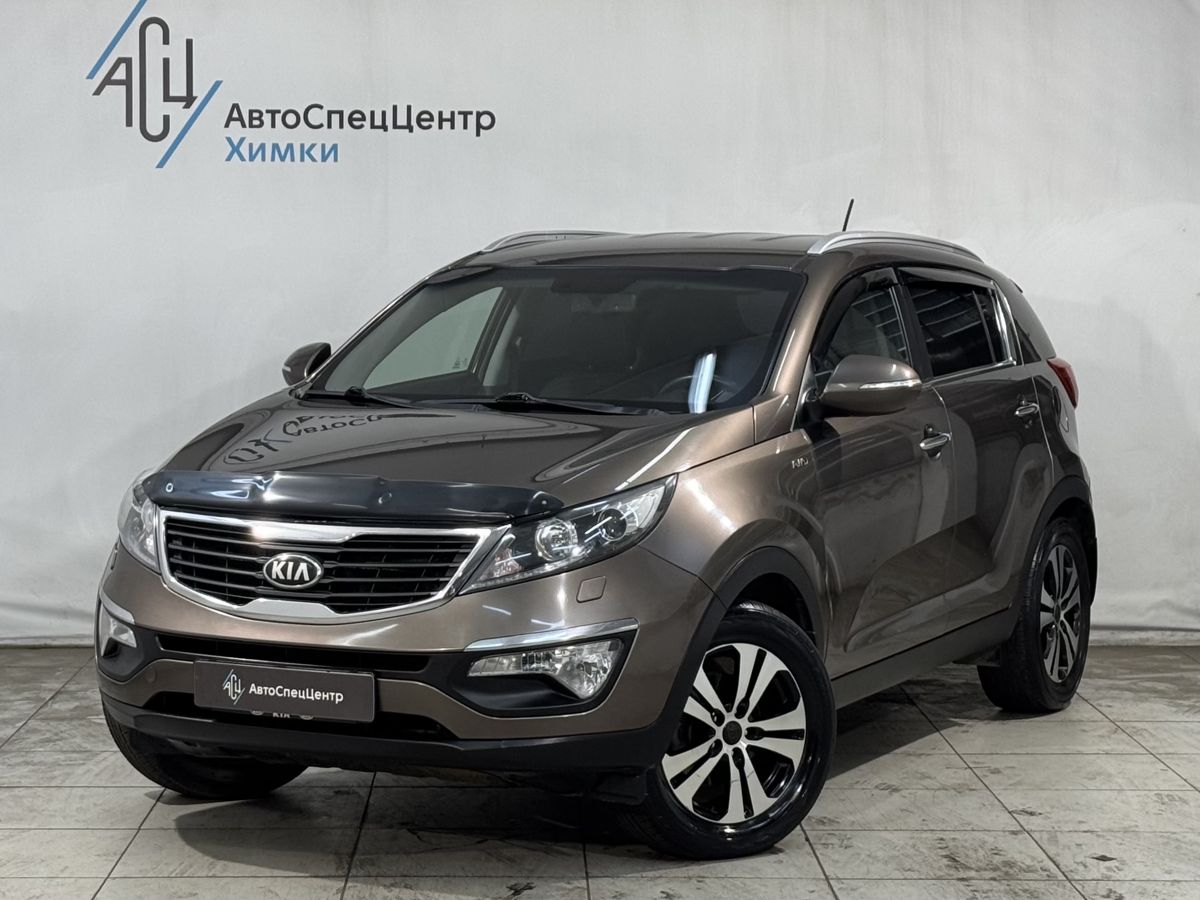 Kia Sportage III поколение 2.0 AT 4WD (150 л.с.) Prestige Коричневый 2013 с пробегом 196 000 км