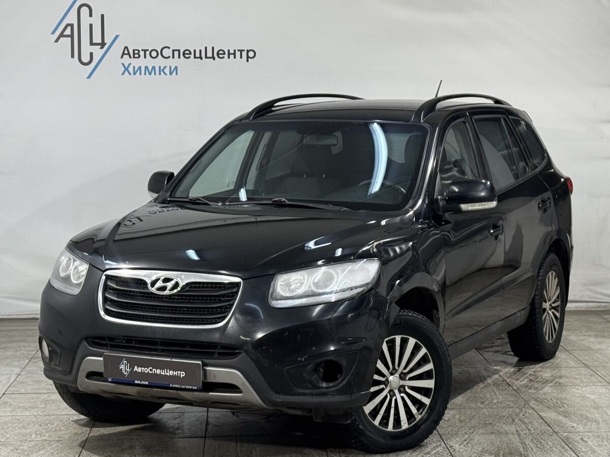 Автомобиль Hyundai Santa Fe II (CM) [рестайлинг] 2.4 AT 4WD (174 л.с.) Comfort Чёрный 2012 с пробегом 185 800 км