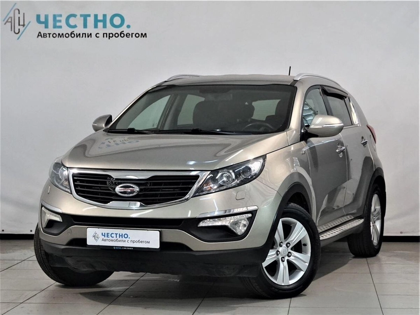 Автомобиль Kia Sportage III поколение 2.0 AT 4WD (150 л.с.) Prestige Бежевый 2012 с пробегом 73 000 км