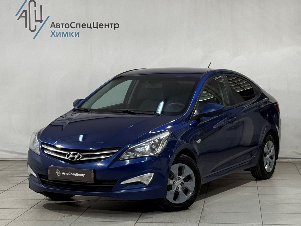 Hyundai Solaris I [рестайлинг] 1.4 AT (107 л.с.) Comfort Синий 2015 с пробегом 140 000 км