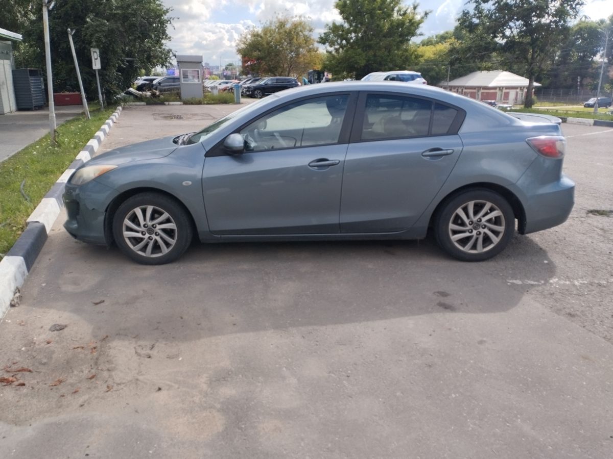 Mazda 3 II (BL) [рестайлинг] 1.6 AT (105 л.с.) Touring Серый 2012 с пробегом 185 615 км