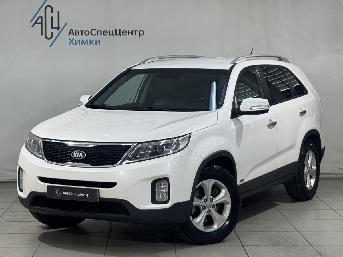 Kia Sorento II [рестайлинг] 2.4 AT 4WD (175 л.с.) New Luxe (2015) Белый 2013 с пробегом 208 000 км