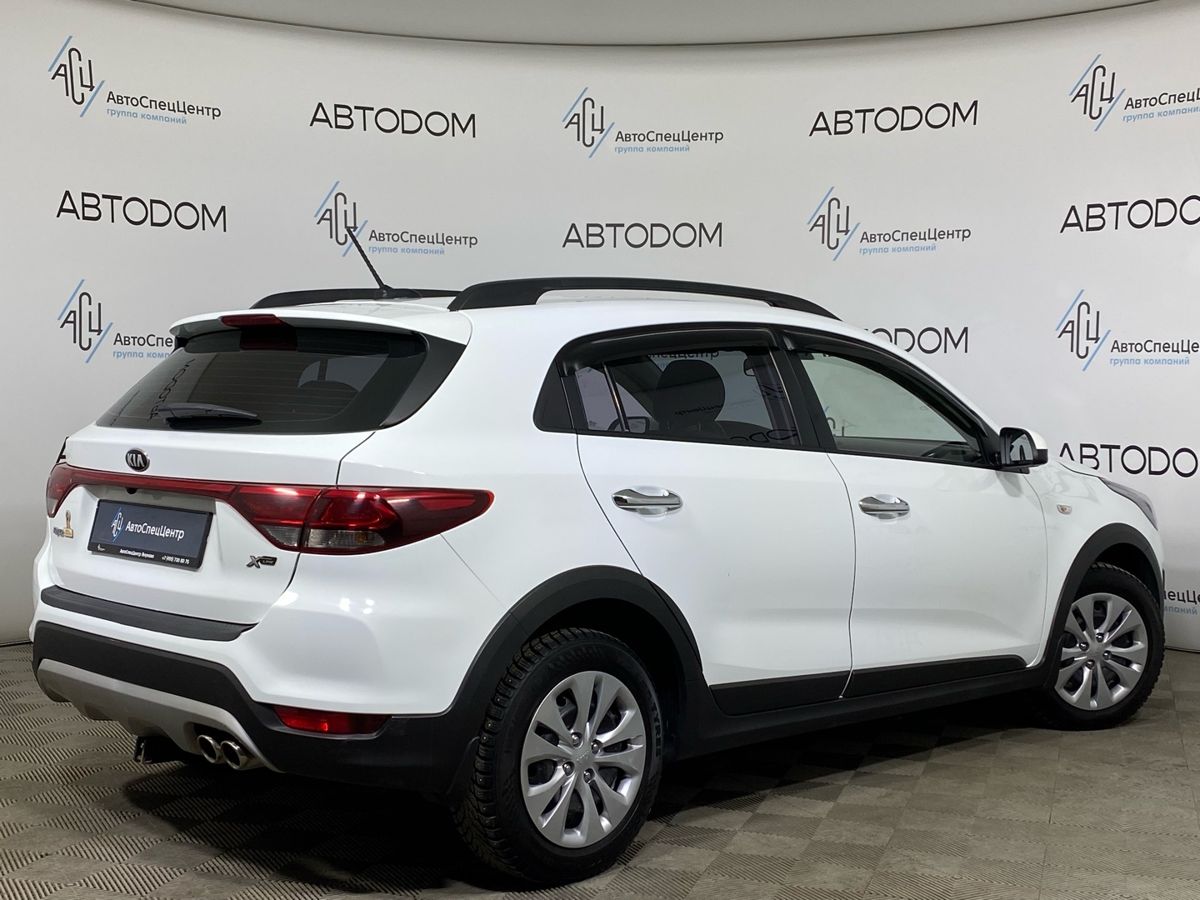 Автомобиль Kia Rio IV поколение 1.6 AT (123 л.с.) Luxe 2018 FWC Белый 2018 с пробегом 87 839 км