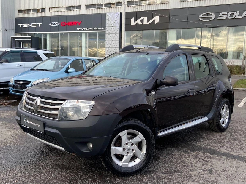 Автомобиль Renault Duster I поколение 2.0 AT 4WD (135 л.с.) Privilege Коричневый 2014 с пробегом 194 755 км