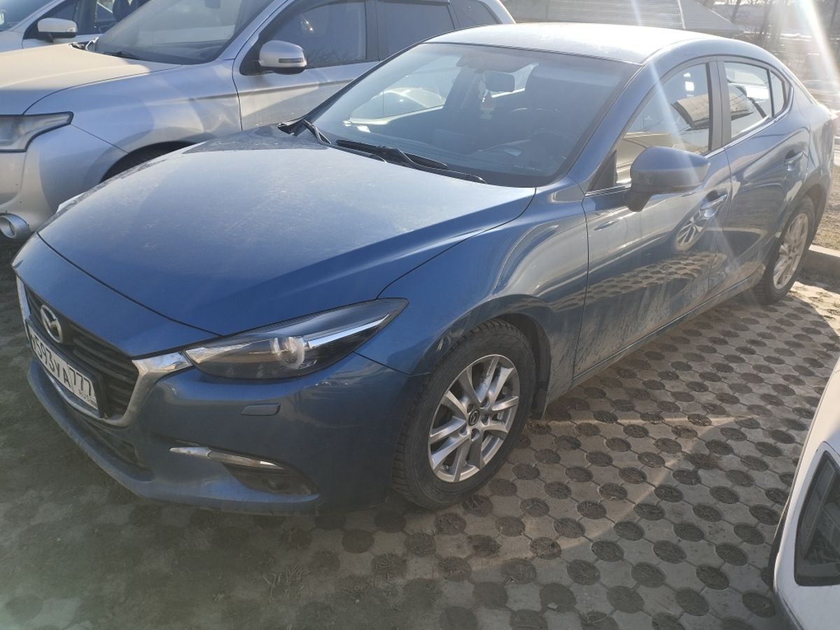 Автомобиль Mazda 3 III (BM) [рестайлинг] 1.5 AT (120 л.с.) Exclusive Голубой 2016 с пробегом 123 291 км