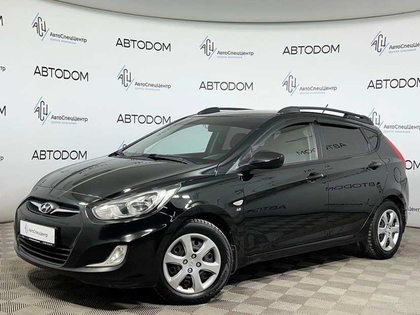 Автомобиль Hyundai Solaris I поколение 1.6 MT (123 л.с.) Classic Чёрный 2012 с пробегом 241 771 км