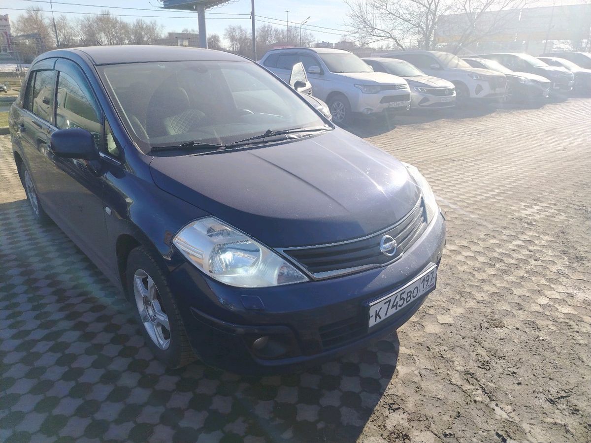 Автомобиль Nissan Tiida I (C11) [рестайлинг] 1.6 AT (110 л.с.) Elegance Синий 2010 с пробегом 192 949 км