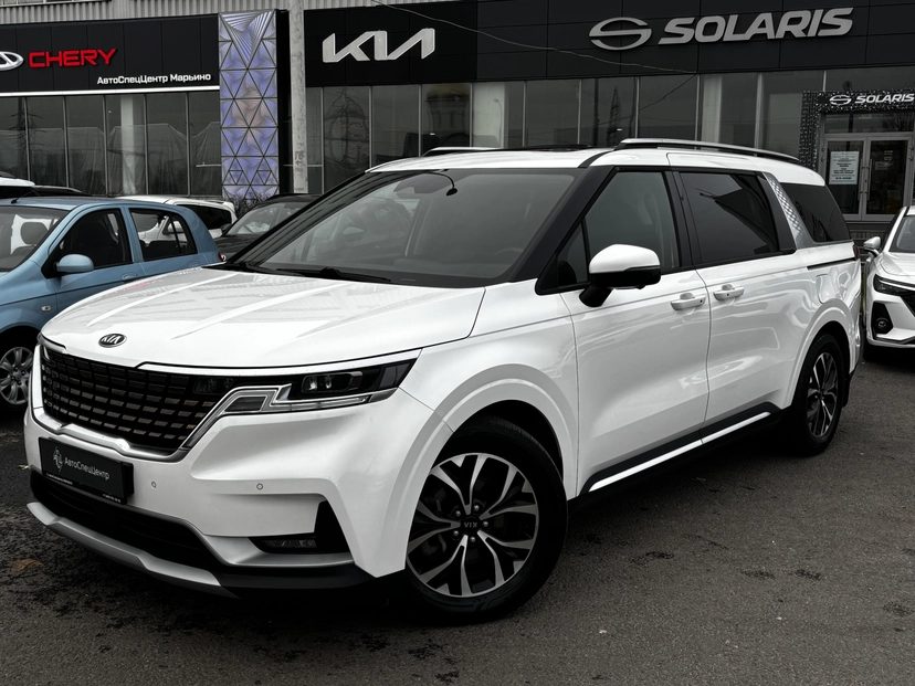 Автомобиль Kia Carnival IV поколение 2.2d AT (199 л.с.) Premium+ Белый 2021 с пробегом 79 850 км