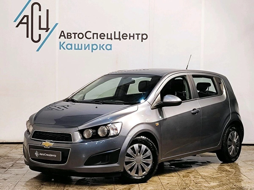 Автомобиль Chevrolet Aveo II поколение (T300) 1.6 AT (115 л.с.) LT Серый 2013 с пробегом 72 835 км