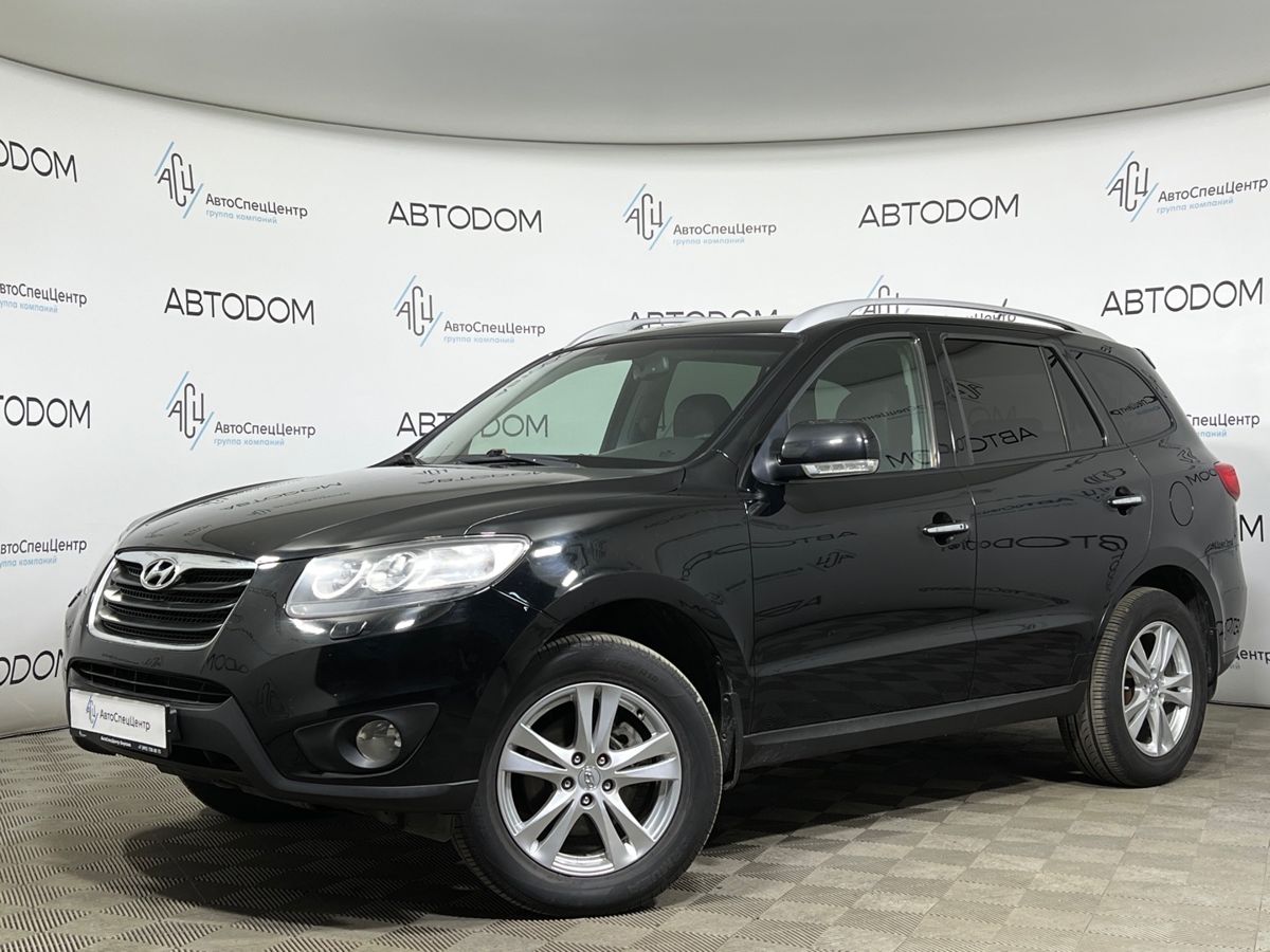 Автомобиль Hyundai Santa Fe II (CM) [рестайлинг] 2.4 AT 4WD (174 л.с.) Elegance + Navi Чёрный 2011 с пробегом 243 000 км