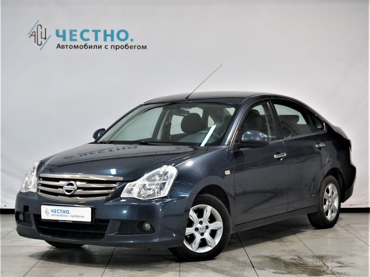 Автомобиль Nissan Almera III поколение (G15) 1.6 AT (102 л.с.) Tekna Черный 2013 с пробегом 162000 км