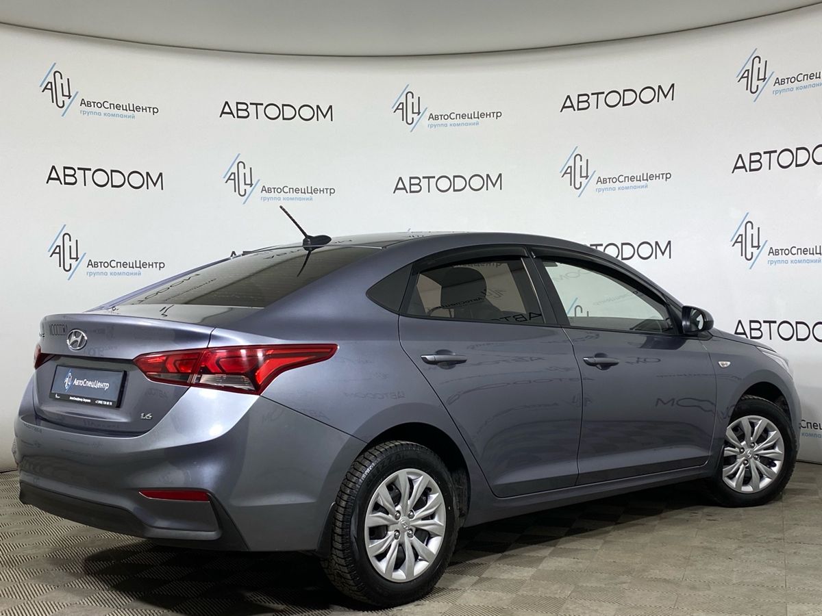 Автомобиль Hyundai Solaris II поколение 1.6 AT (123 л.с.) Active Plus Серый 2017 с пробегом 130 000 км