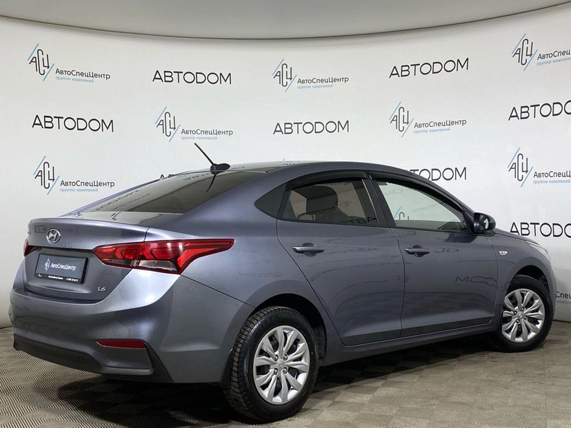 Автомобиль Hyundai Solaris II поколение 1.6 AT (123 л.с.) Active Plus Серый 2017 с пробегом 130 000 км