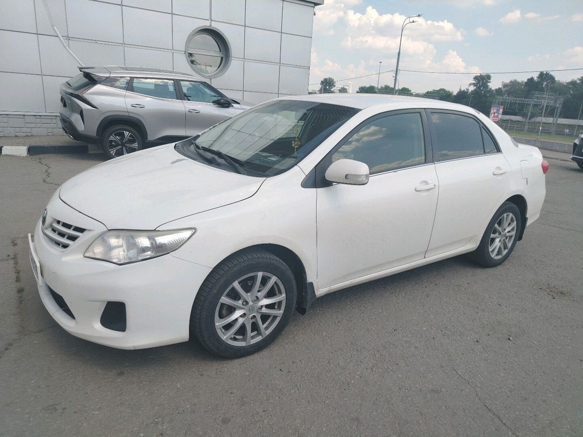 Toyota Corolla X (E140/E150) [рестайлинг] 1.6 MT (124 л.с.) Комфорт плюс Белый 2012 с пробегом 285 431 км