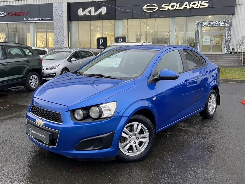 Автомобиль Chevrolet Aveo II поколение (T300) 1.6 AT (115 л.с.) LT Синий 2013 с пробегом 124 500 км