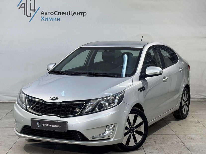 Автомобиль Kia Rio III поколение 1.6 4AT (123 л.с.) Premium Серебристый 2013 с пробегом 92 000 км