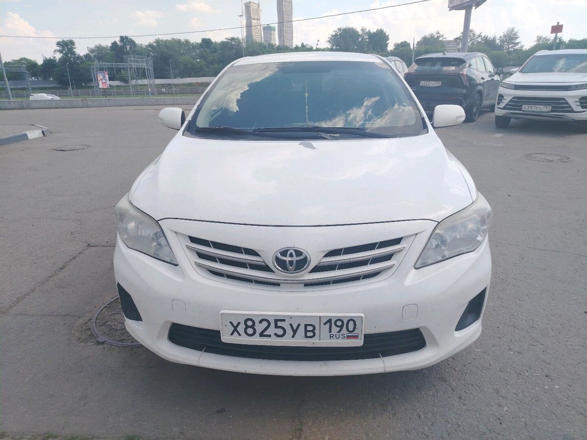 Toyota Corolla X (E140/E150) [рестайлинг] 1.6 MT (124 л.с.) Комфорт плюс Белый 2012 с пробегом 285 431 км