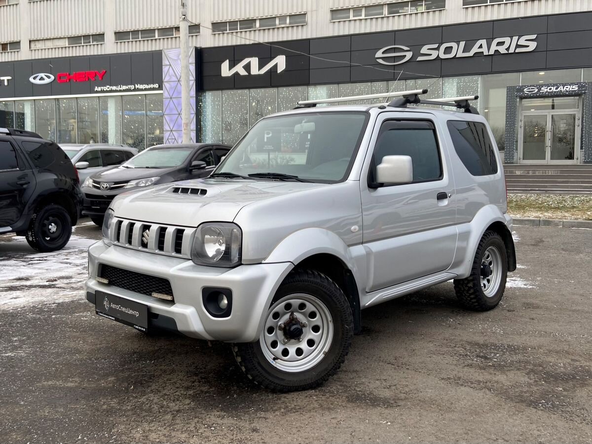 Автомобиль Suzuki Jimny III [2-й рестайлинг] 1.3 AT 4WD (85 л.с.) JLX Серебристый 2018 с пробегом 23 500 км