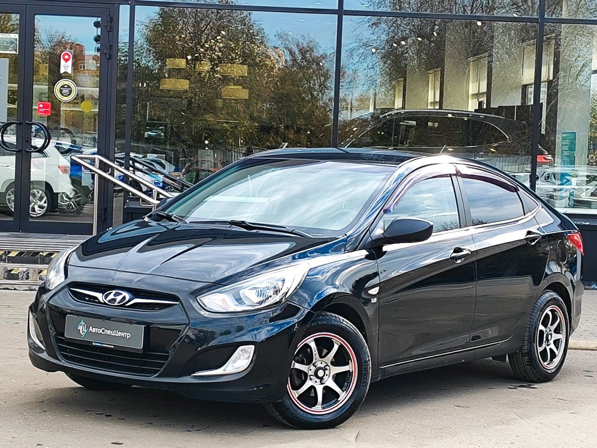 Hyundai Solaris I поколение 1.6 MT (123 л.с.) Comfort Чёрный 2013 с пробегом 128 000 км