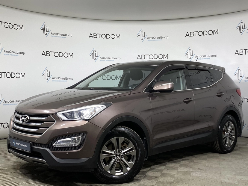 Автомобиль Hyundai Santa Fe III поколение (DM) 2.4 AT 4WD (175 л.с.) Comfort Коричневый 2013 с пробегом 81 327 км