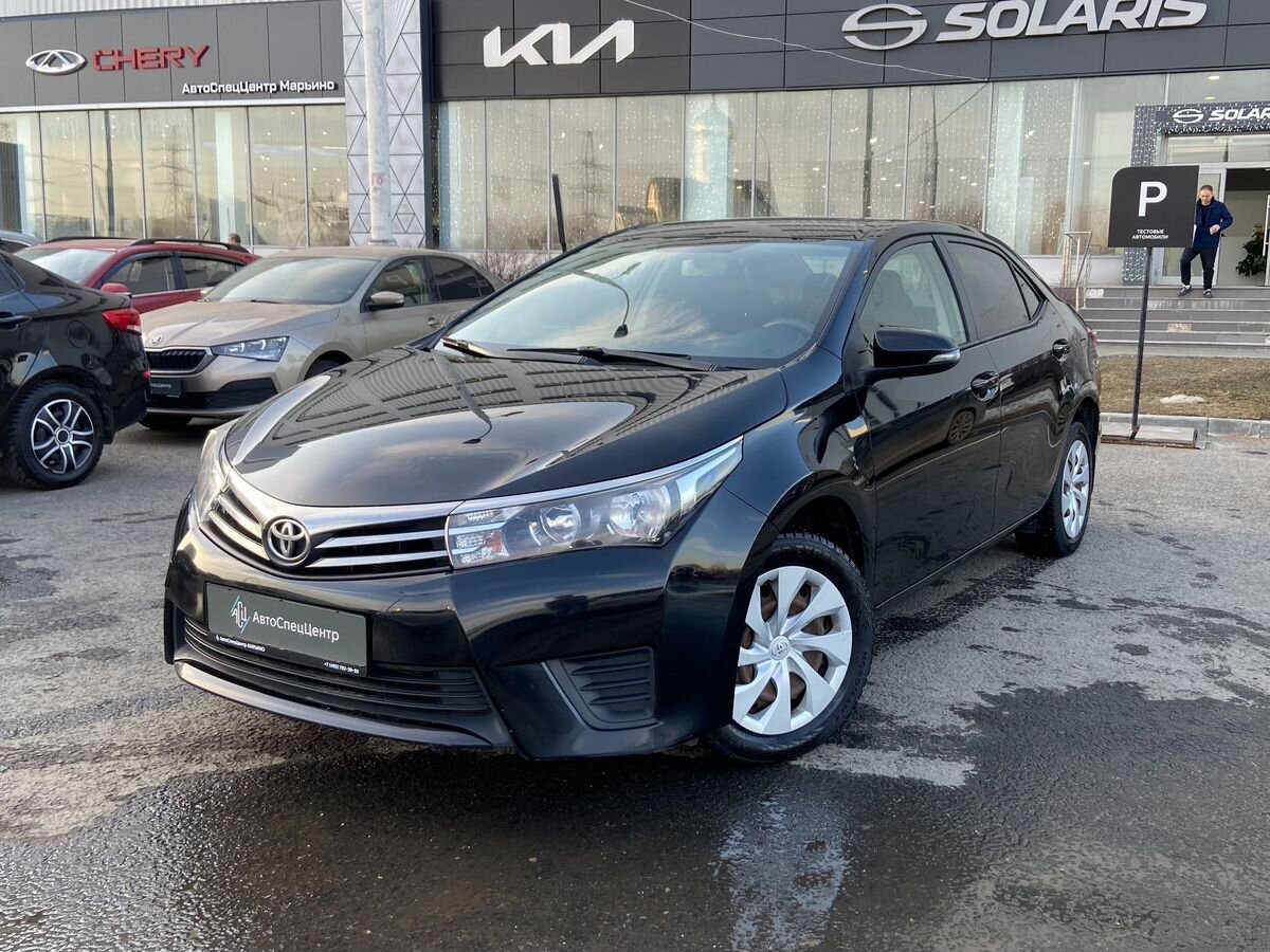 Автомобиль Toyota Corolla XI (E160/E170) 1.6 CVT (122 л.с.) Классик Чёрный 2016 с пробегом 158 000 км