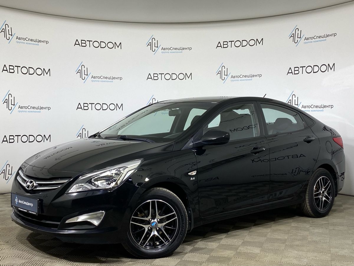 Автомобиль Hyundai Solaris I [рестайлинг] 1.6 AT (123 л.с.) Comfort Чёрный 2015 с пробегом 57 743 км