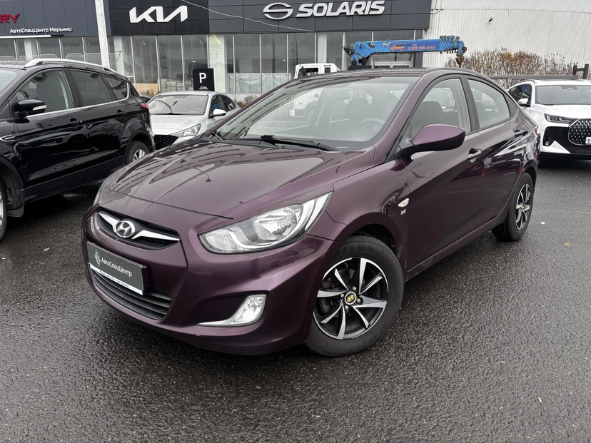 Автомобиль Hyundai Solaris I поколение 1.6 MT (123 л.с.) Comfort Фиолетовый 2012 с пробегом 167 000 км