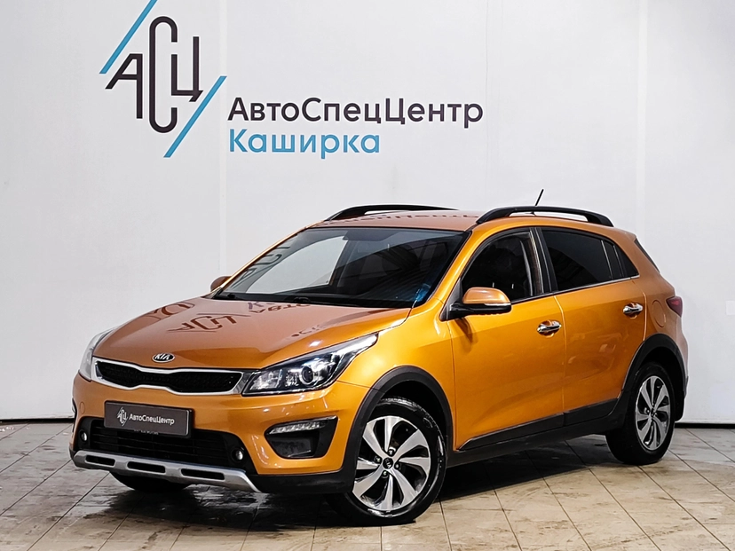 Автомобиль Kia Rio IV поколение 1.6 AT (123 л.с.) Premium Оранжевый 2019 с пробегом 151 903 км