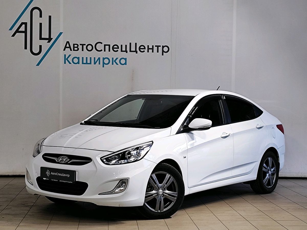 Hyundai Solaris I поколение 1.6 AT (123 л.с.) Family Белый 2013 с пробегом 148 846 км