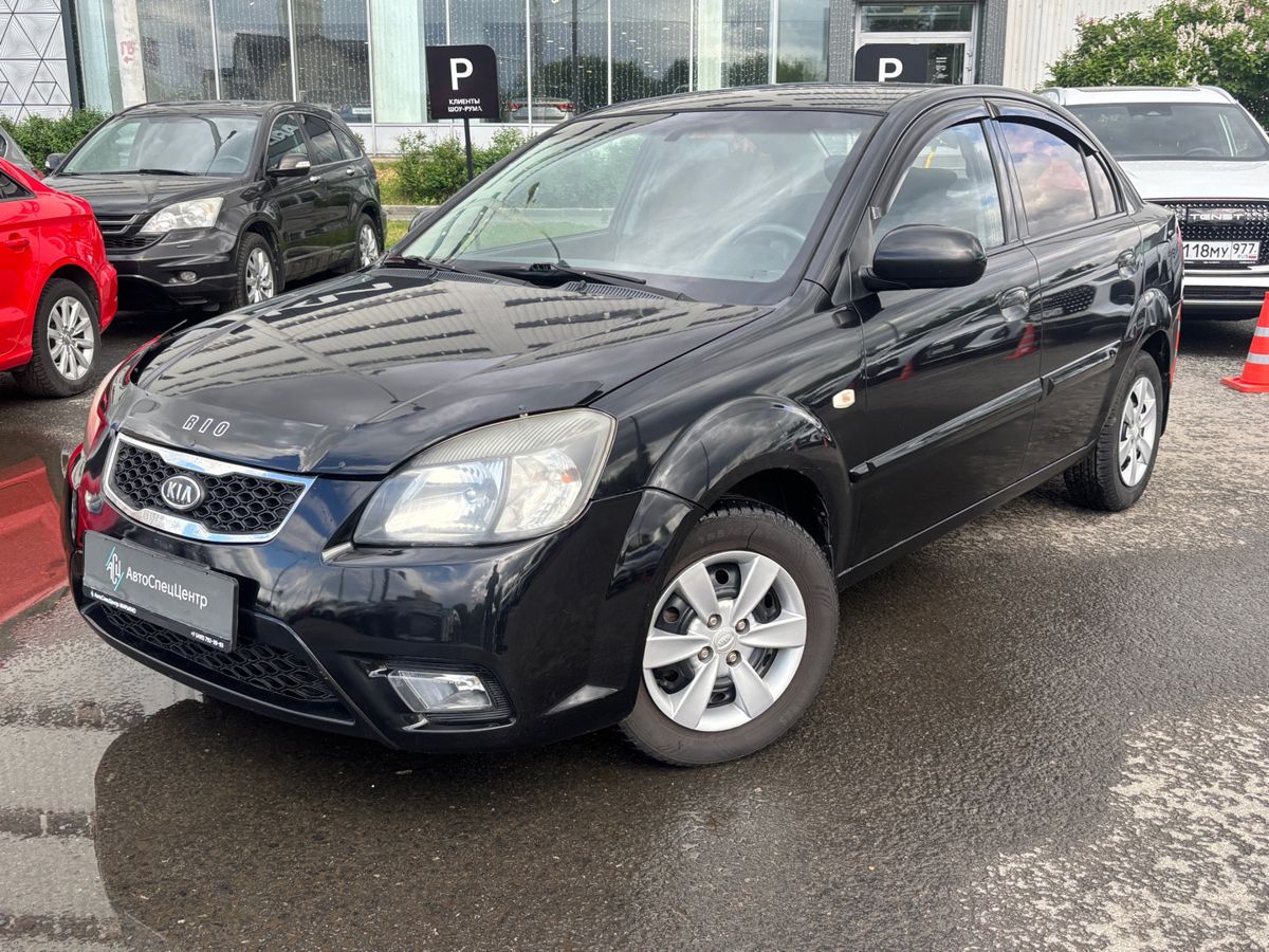 Kia Rio II [рестайлинг] 1.4 MT (95 л.с.) Comfort Чёрный 2010 с пробегом 193 900 км