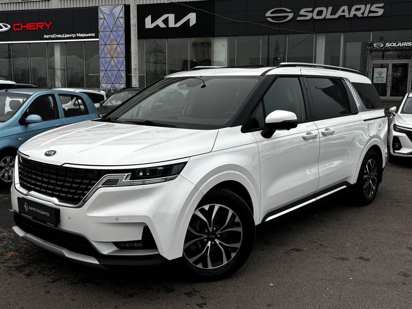 Автомобиль Kia Carnival IV поколение 2.2d AT (199 л.с.) Premium+ Белый 2021 с пробегом 79 850 км