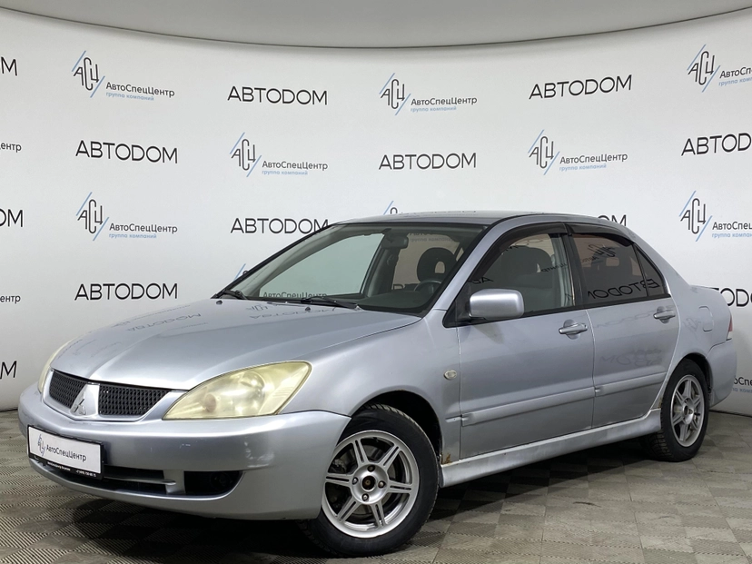 Автомобиль Mitsubishi Lancer IX поколение 1.6 AT (98 л.с.) Base Серебристый 2005 с пробегом 253 374 км