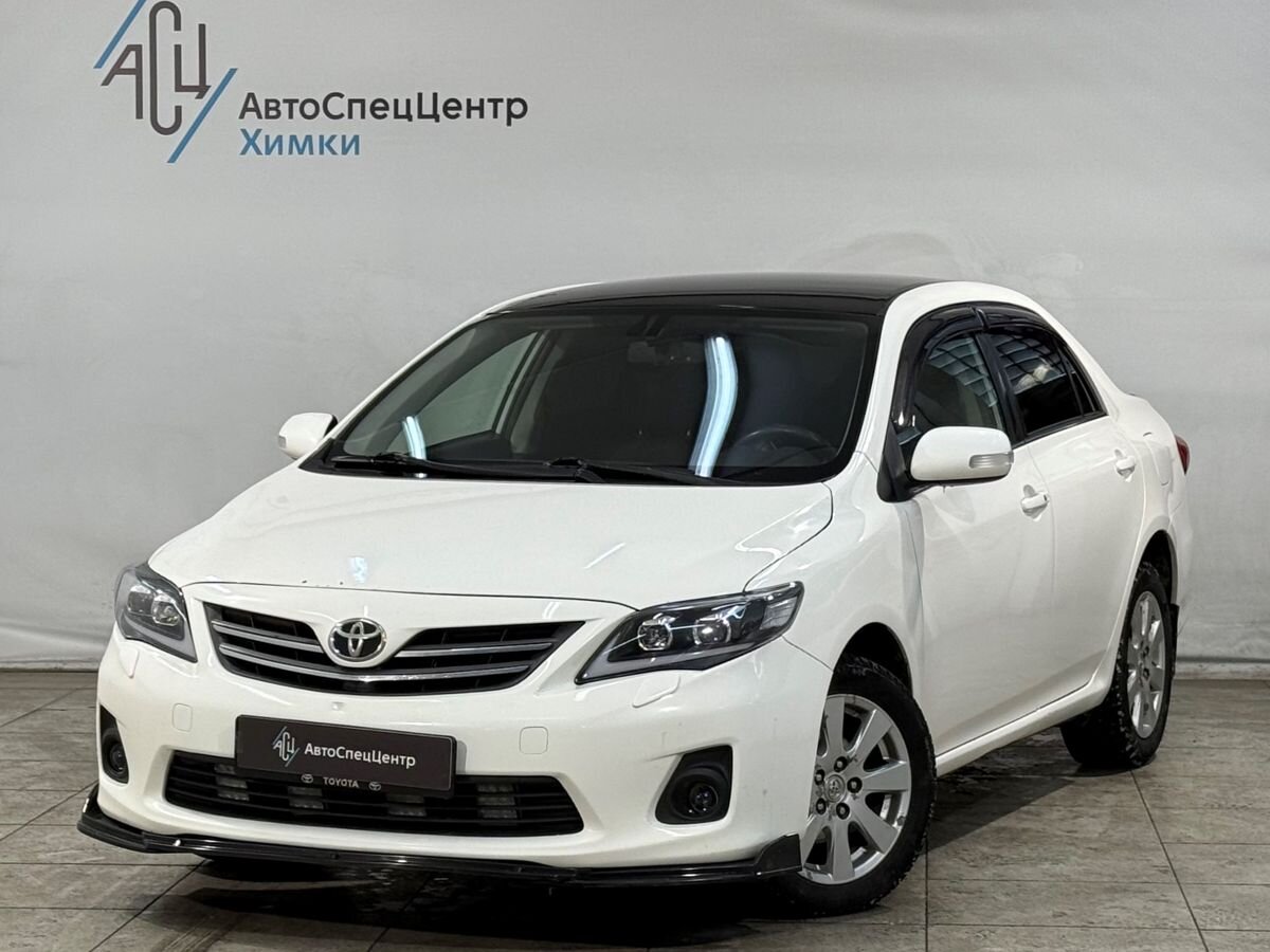 Автомобиль Toyota Corolla X поколение (E140/E150) 1.6 AT (124 л.с.) Base Белый 2010 с пробегом 200 000 км