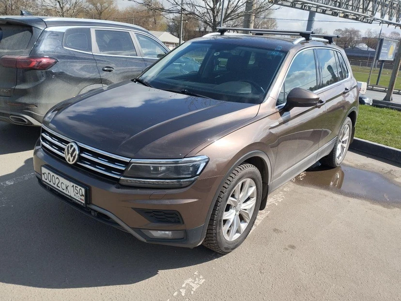 Автомобиль Volkswagen Tiguan II поколение 1.4 AMT 4WD (150 л.с.) Offroad Коричневый 2017 с пробегом 172 418 км