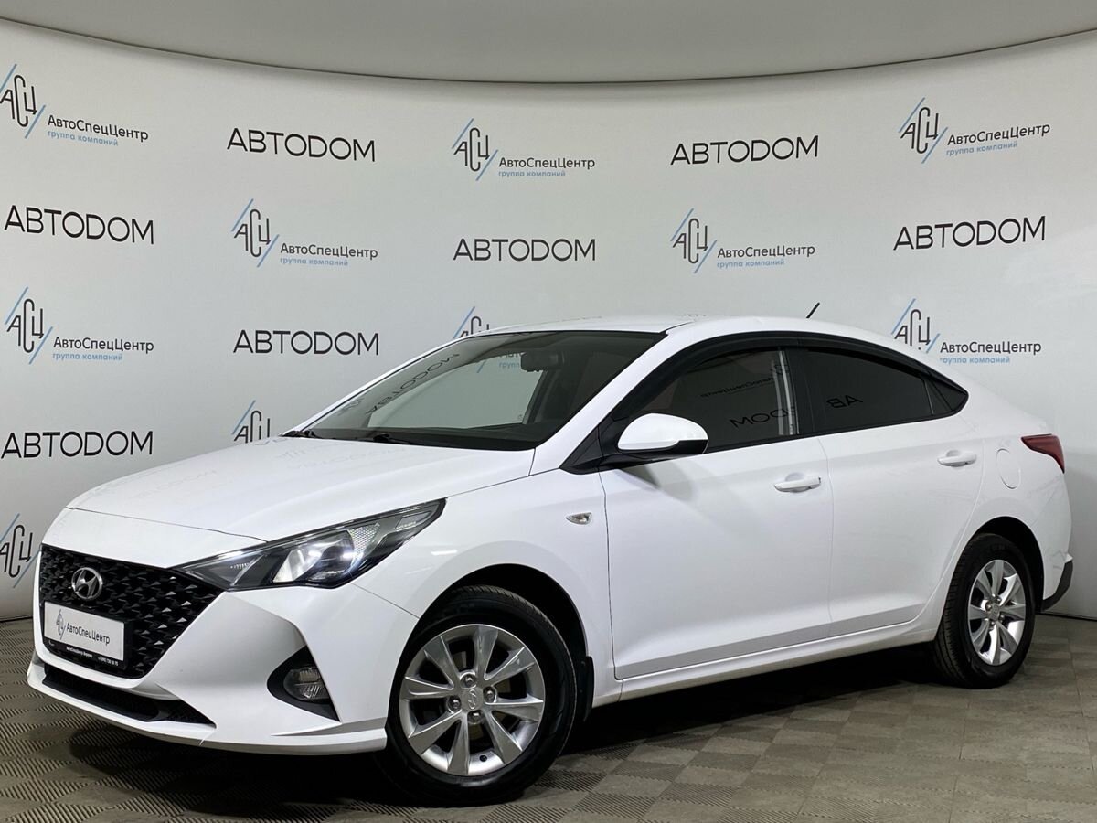 Автомобиль Hyundai Solaris II [рестайлинг] 1.4 AT (100 л.с.) Active + Пакет Кондиционер Белый 2022 с пробегом 34 598 км