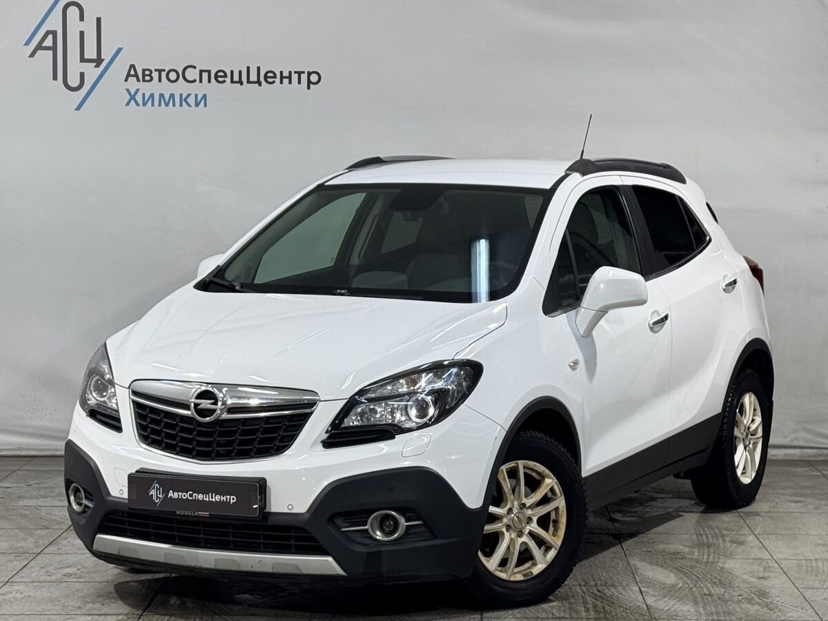Автомобиль Opel Mokka I поколение 1.4 AT (140 л.с.) Cosmo Белый 2014 с пробегом 135 000 км